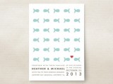 a pretty and fun beach wedding invitations with lots of aqua-colored fish printed and some black lettering is a lovely and cool idea