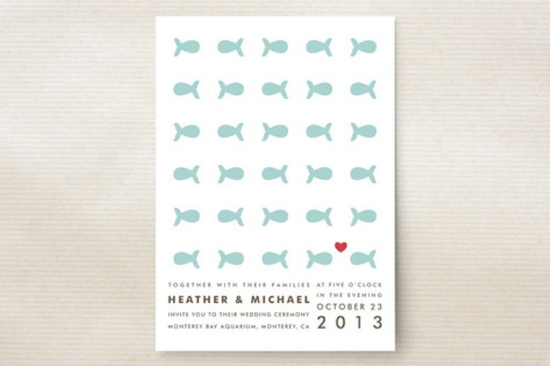 A pretty and fun beach wedding invitations with lots of aqua colored fish printed and some black lettering is a lovely and cool idea