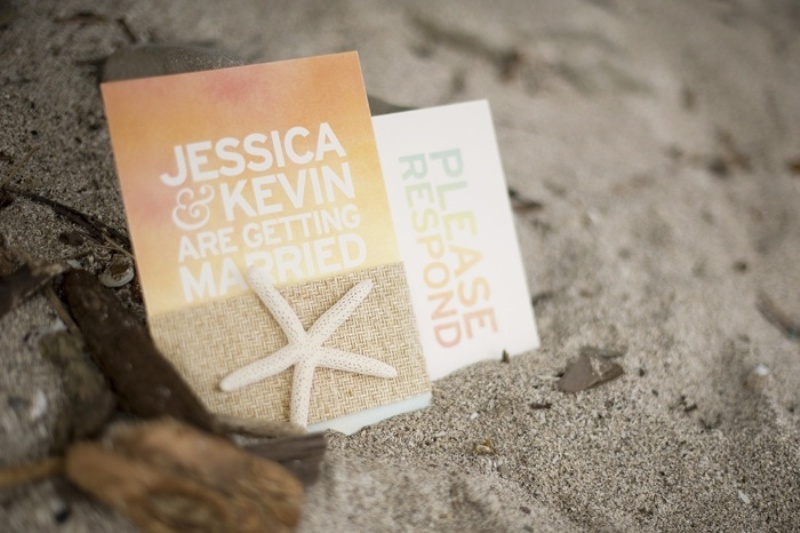 A bright and fun orange and tan wedding invitation suite with burlap and starfish, with white and gold lettering is amazing