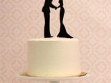 add a black silhouette cake topper to a simple white wedding cake and it will be a new cake showing your personality