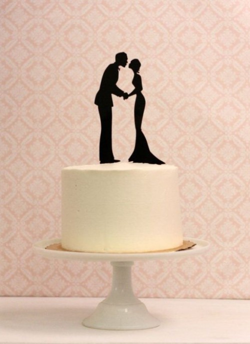 add a black silhouette cake topper to a simple white wedding cake and it will be a new cake showing your personality