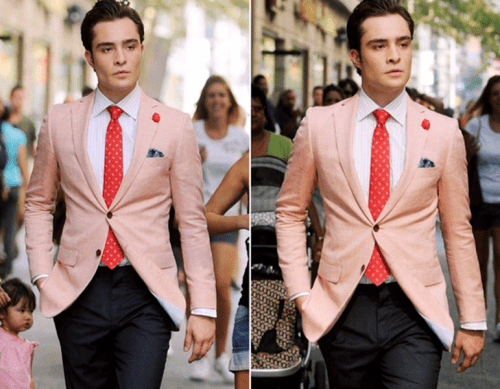 a peachy blazer, a white shirt and a red tie plus black pants for a super dapper and bold look