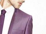 a purple suit, a white shirt and a purple tie for a stylish jewel-toned groom’s look