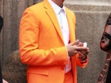 a bright orange suit, a white shirt and a white tie will help you make a statement at the wedding