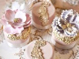 pastel individual wedding cakes decorated with gold edible lace and sugar blooms on top for a refined and glam wedding