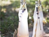 fresh lavender lemonade in mini bottles and straws will refresh your guests perfectly at a spring or summer wedding