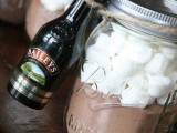 hot cocoa jars with mini Bailey’s bottles are amazing to rock as drinkable wedding favors