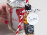 a jar with Coke and a small Jack Daniel’s bottle to make a nice alcohol cocktail afterwards