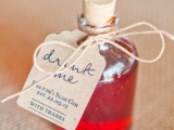 a mini Drink Me bottle with gin is a nice and bold drinkable wedding favor for adults