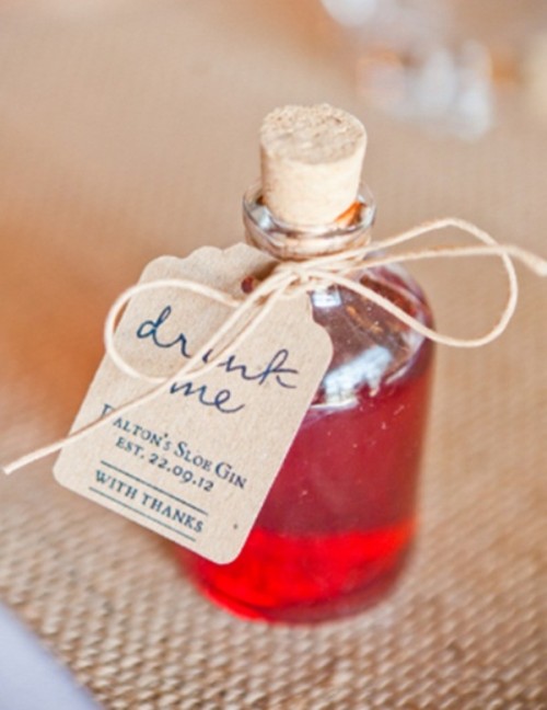 a mini Drink Me bottle with gin is a nice and bold drinkable wedding favor for adults