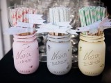 pastel-colored mason jars with pastel straws are cool for serving them at your wedding drink station, offer them to your guests