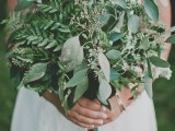 a textural greenery wedding bouquet with blooming branches is a cool idea for a casual spring or summer wedding