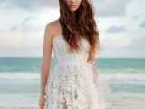a romantic wavy half updo with messy beach waves is a lovely idea for a beach bride, whether it’s a destination wedding or not