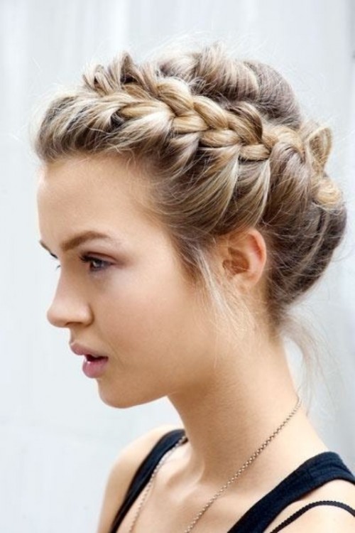 a voluminous braided updo with some locks down is a chic and lovely idea for a destination wedding, it will be in place and will keep you picture-perfect