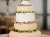 a lovely cheese wheel wedding cake decorated with lavender and thyme is a chic idea for a Provence-inspired wedding