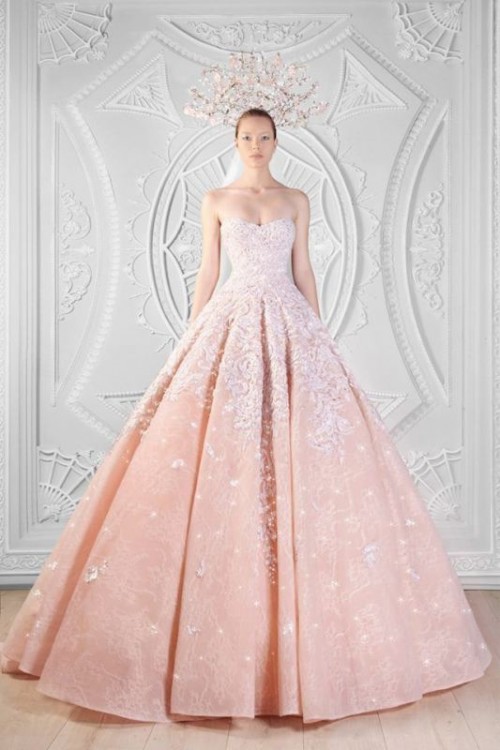a strapless peach wedding ballgown with a white lace appliques and rhinestones all over is a chic and beautiful idea