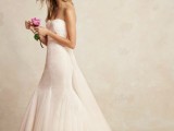 a blush strapless mermaid wedding dress with a train and a slight ombre effect is a romantic and sexy idea