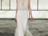 a chic loose wedding dress with an embellished bodice and a layered plain skirt plus a plunging neckline