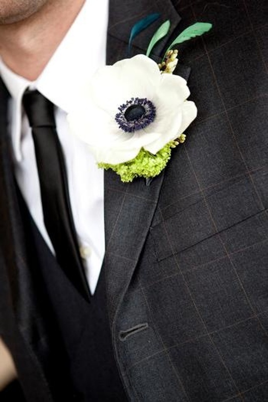 a black windowpane suit, a white shirt and a black skinny tie and a white anemone boutonniere are a great and chic combo for an elegant wedding