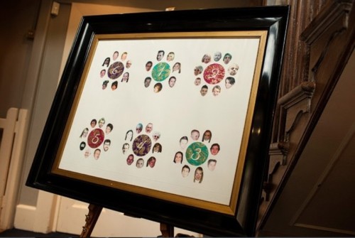 a fun photo seating chart with table numbers and photos of the guests is a creative idea for a small wedding