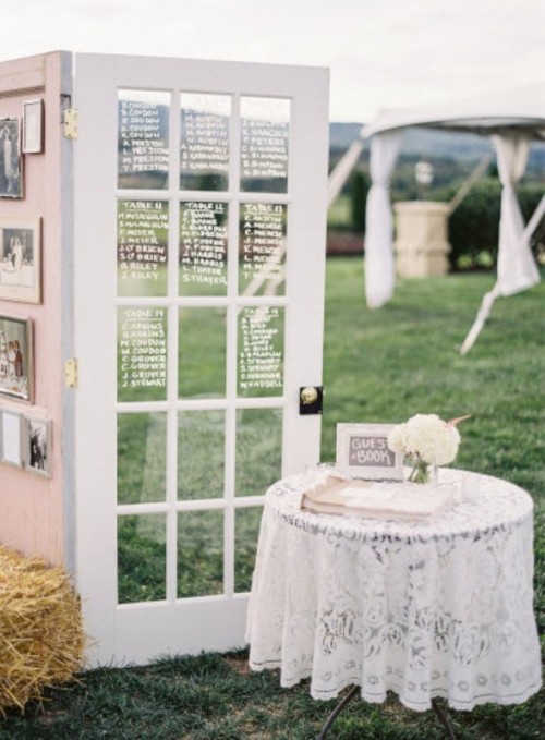 a vintage door as a seating chart is a stylish idea for a vintage wedding, you can easily DIY it