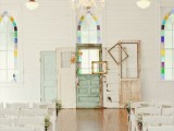 an arrangement of shabby chic neutral and pastel doors plus blooms is a cool idea for an indoor vintage wedding ceremony
