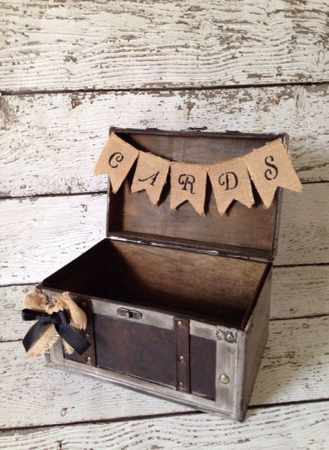 a wood box with a burlap bunner is nice for cards and wishes to your couple