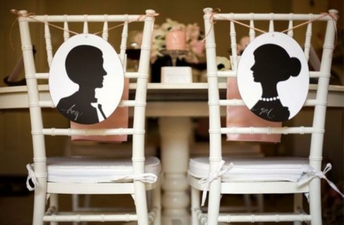 chairs with elegant silhouette decor on them are a stylish idea for a wedding, they will add a slight vintage feel to your reception