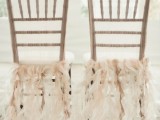gold chairs accented with blush ruffle ribbons look very stylish, chic and dreamy and add a romantic touch to the space