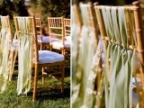 sage green fabric ribbons on gold chairs are an amazing and chic idea for a wedding, they create a dreamy and stylish look
