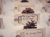 pinecones with cards are lovely escort card ideas for a fall or winter wedding or just a woodland one