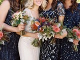 mismatching sparkling navy and silver bridesmaid dresses