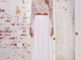 a modern boho bridal look with a lace crop top with long sleeves and a plain skirt with pleating is a lovely idea for a boho wedding