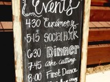 a chalkboard sign with calligraphy and a wooden frame is a lovely idea for a relaxed and fun wedding