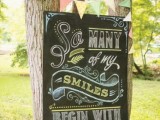 a chalkboard sign with bright letters is a nice idea for a wedding, it can be a relaxed and fun wedding or some other non-formal one