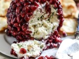 a cheese ball covered with pomegranated seeds is a lovely idea for a wedding, it’s a delicious appetized for a celebration