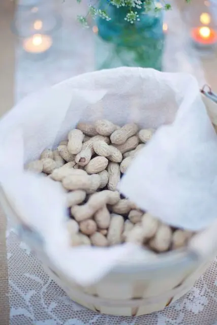 various kinds of nuts served in baskets is a cool idea to rock, add paper bags to serve them