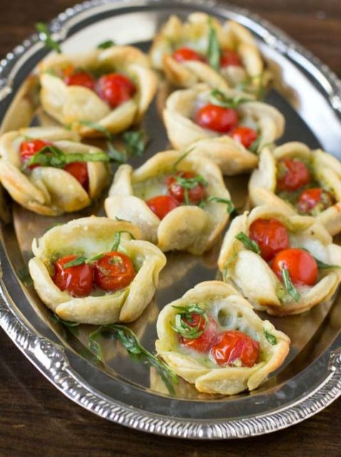 pastry cups with sundried tomatoes and fresh herbs are tasty snacks suitable for vegan weddings