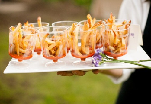 French fries with tomato sauce served in elegant cups are a cool idea