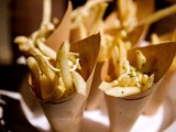 cones with fresh French fries with herbs are a fantastic and timeless wedding snack idea