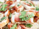 tasty sandwiches with prosciutto and fresh arugula are a gorgeous snack idea