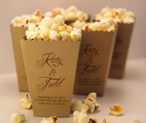 boxes with fresh popcorn - salted or sweet - can be a nice snack idea for a wedding