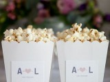 boxes with popcorns are personalized with monograms