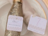 mini gold glitter champagne bottles are very cool Christmas, NYE or just winter wedding favors