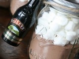 hot cocoa mix in a jar and a mini Bailey’s bottle is a great and delicious wedding favor for a winter or Christmas celebration
