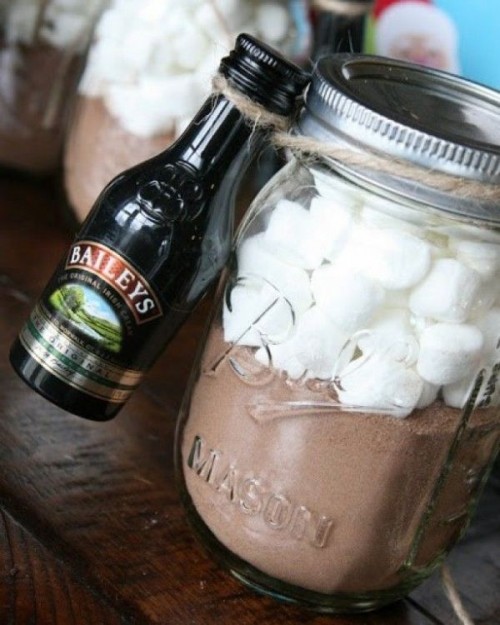 hot cocoa mix in a jar and a mini Bailey's bottle is a great and delicious wedding favor for a winter or Christmas celebration