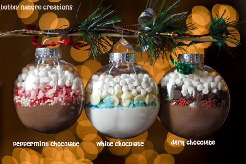 Sheer glass wedding favors filled with hot cocoa mix are delicious and very cute looking, make them yourself