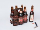 a holder for beer bottles is a creative and fun idea of a groomsmen gift, most of guys will appreaciate it