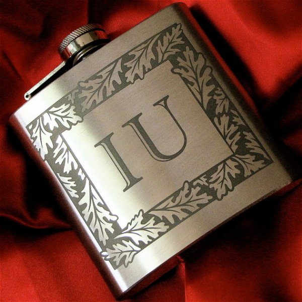 Personalized flasks with refined design are always a good idea for groomsmen, they won't break the budget