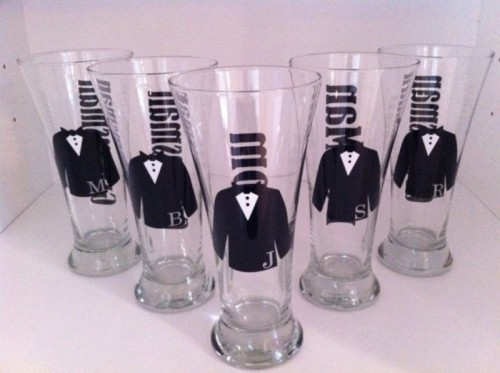 tall beer glasses with painted tuxedos and names on them are simple and fun groomsmen gifts to rock